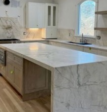 Transformed this outdated kitchen into stunning white marble.